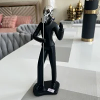 Singer with Mike Sculpture