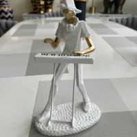 Piano Player Sculpture